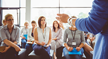 Group of professionals sitting in a meeting