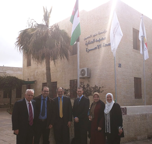 Dr. James L. Griffith and Dr. Michael D. Morse outside the Al-Hussein Foundation-Institute for Family Health in Jordan.