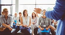Group of professionals sitting in a meeting